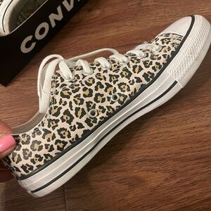 I love my Converse, but my foot has gotten too wide for them.